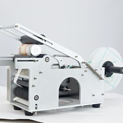 32KGS Máquina de etiquetado de botellas semiautomática redonda de alta precisión Máquina de etiquetado para botellas