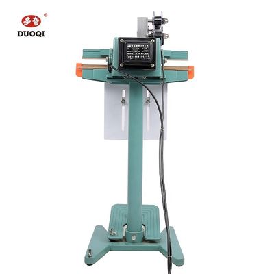 DUOQI PFS-450*1 Máquina de sellado con pedal de pie para bata médica en planta de fabricación