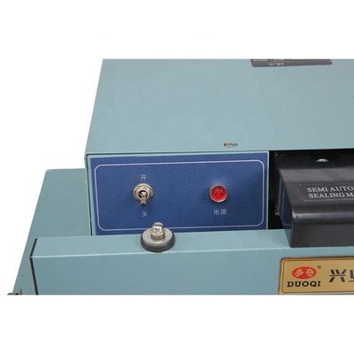 DUOQI FKR-450 Máquina semiautomática de sellado de mesas para materiales químicos y la industria alimentaria