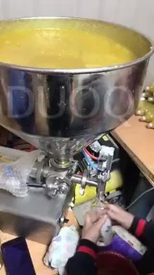 Cargador de pasta neumática de dos cabezas para bebidas Cosméticas Salsa de crema Miel 65 kg