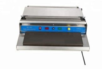 Máquina de embalaje manual de película adhesiva para embalaje manual eléctrico de grado alimentario 220V 5kg
